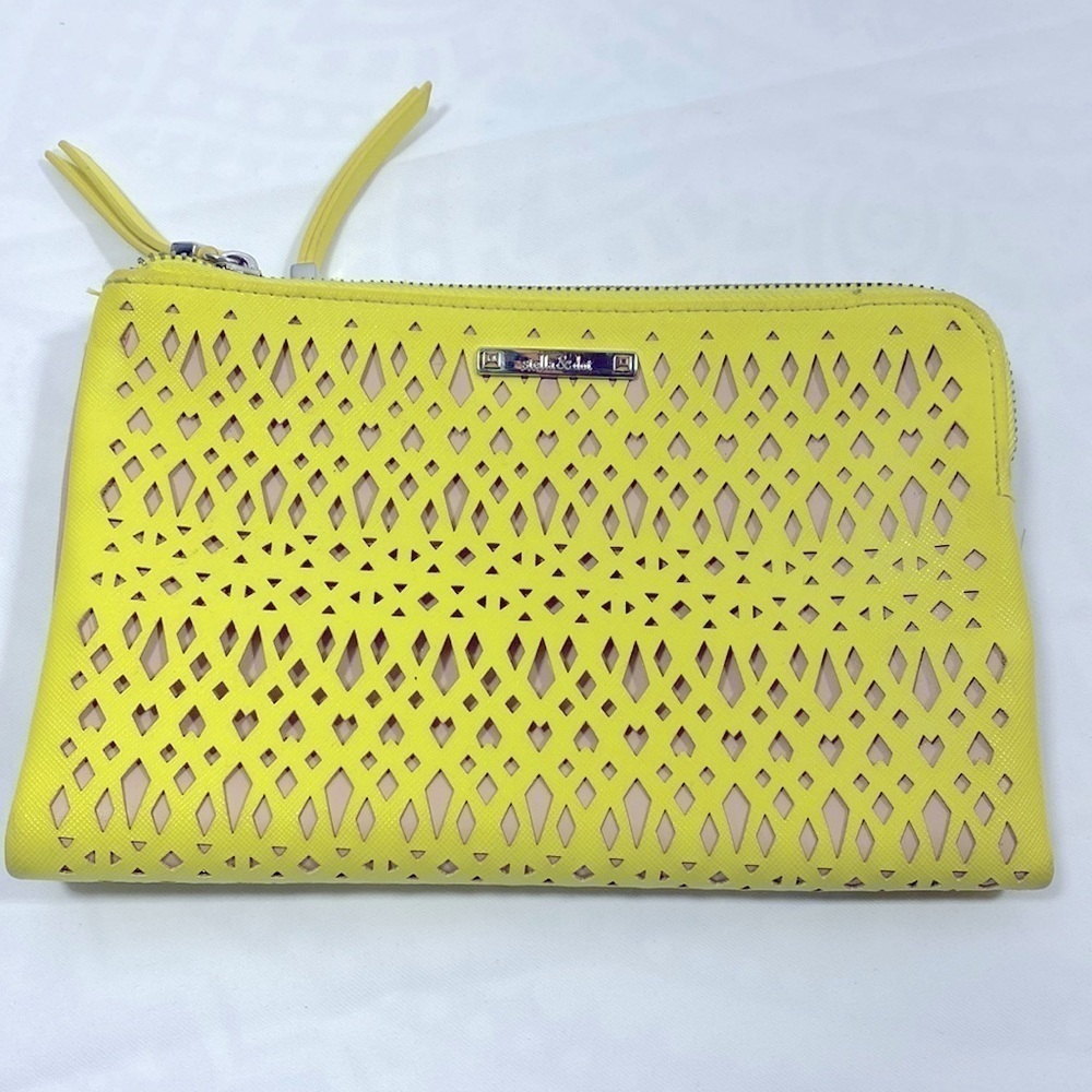 Stella and dot yellow and tan clutch​​​​​​​​​​